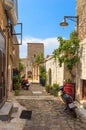 Traditional paved street in Areopolis town, Greece Royalty Free Stock Photo