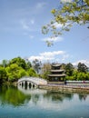 Traditional pavilion and stone bridge at the Black Dragon Pool i