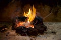 A traditional peat turf fire in an open fireplace. Royalty Free Stock Photo