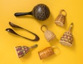 Traditional percussion instruments on yellow background Royalty Free Stock Photo