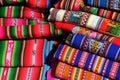 Traditional peruvian colorful textiles piled