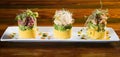 Traditional Peruvian dish called Causa made of mashed potato with aji hot pepper and lime juice and filled with