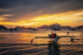 Traditional philippine boats in El Nido at sunset lights, Philippines Royalty Free Stock Photo