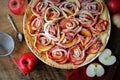 Traditional pie with apple shaped roses, fruit dessert, tart on wooden rustic table. Top view Royalty Free Stock Photo