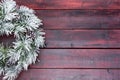 Traditional pine Christmas wreath frosted in snow