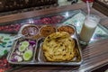 Traditional platter in Punjab (Punjabi Thali), with a glass of lassi, Amritsar, Ind