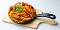 Traditional Polish dish called bigos made of sauerkraut, sausage and mushrooms, food served warm in a cast iron pan Royalty Free Stock Photo