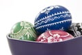 Traditional polish easter eggs in violet cup Royalty Free Stock Photo