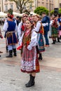 Traditional Polish Folk Costumes on parade in Krakow Main Market Square