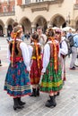 Traditional Polish Folk Costumes on parade in Krakow Main Market Square