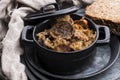 Traditional polish sauerkraut bigos with mushrooms and plums for christmas Royalty Free Stock Photo