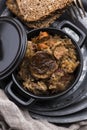 Traditional polish sauerkraut bigos with mushrooms and plums for christmas Royalty Free Stock Photo