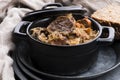 Traditional polish sauerkraut bigos with mushrooms and plums Royalty Free Stock Photo