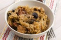 Traditional polish sauerkraut (bigos) with mushrooms and plums Royalty Free Stock Photo