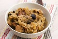 Traditional polish sauerkraut (bigos) with mushrooms and plums Royalty Free Stock Photo