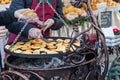 Traditional polish smoked cheese oscypek on Christmas market in
