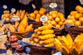 Traditional polish smoked cheese oscypek on outdoor market in Krakow, Poland.