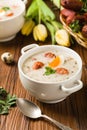 Traditional Polish white borsch with Easter decoration Royalty Free Stock Photo