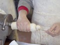 Traditional pork salami making using pig intestines for skin. Rustic, rural Italy. Genuine farm production.