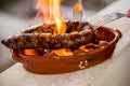 Traditional portuguese chourico or spanish chorizo prepared in a Royalty Free Stock Photo