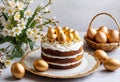 A traditional Portuguese Easter cake with golden eggs and flowers on a table Royalty Free Stock Photo