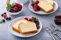 Traditional pound cake sliced on a plate served with berries