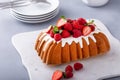 Traditional pound cake topped with glaze and fresh berries Royalty Free Stock Photo