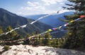 Traditional prayer Tibetan Buddhist flags Lung Ta on the way to Taktshang GoembaTiger`s Nest Monastery, the most famous Monaster Royalty Free Stock Photo