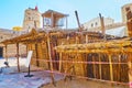 Traditional primitive house of palm branches in Al Fahidi Fort, Dubai, UAE