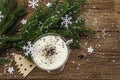 Traditional prune dessert with nuts and whipped sour cream with sugar. New Year`s sweet treat concept. Wooden boards background Royalty Free Stock Photo