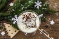 Traditional prune dessert with walnuts and whipped sour cream with sugar. New Year`s sweet treat concept. Wooden boards backgroun Royalty Free Stock Photo