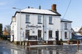 Traditional public house in North Shropshire village of Shawbury with snow