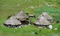 Traditional quechua village houses with conic straw roof Royalty Free Stock Photo