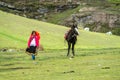 Traditional quechua woman with horse