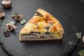 Traditional quiche pie with mushrooms, chicken and cheese
