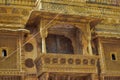 Traditional Rajasthani haveli with a decorated window at Patwon ki haveli in Jaisalmer, Rajasthan, India. Series of early-1800s