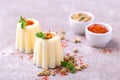 Indian kulfi dessert, ice cream with safron, mint, nuts