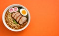 Traditional Ramen With Chashu Pork Egg And Narutomaki On Bright Orange Background Royalty Free Stock Photo