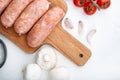 Traditional raw pork sausages, flat lay, on white background