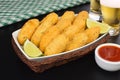 Traditional recipe codfish balls in black background Royalty Free Stock Photo