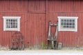 Traditional red barn wall, a window and a sled Royalty Free Stock Photo
