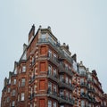 Traditional red brick apartment block in Kensington and Chelsea, London, UK Royalty Free Stock Photo