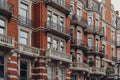 Traditional red brick apartment block in Kensington and Chelsea, London, UK Royalty Free Stock Photo