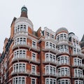 Traditional red brick apartment block in Kensington and Chelsea, London, UK Royalty Free Stock Photo