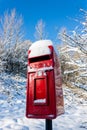 Traditional red postbox in the snow Royalty Free Stock Photo