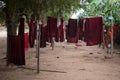 Traditional red buddhist robes hang drying Royalty Free Stock Photo