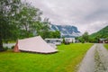 Traditional red camping houses in Lunde Camping, Norway July 21, 2019. Classical Norwegian Camping site with traditional wooden Royalty Free Stock Photo