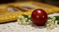 Traditional red Easter egg with lilies of the valley Royalty Free Stock Photo