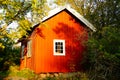 Traditional red garden house Stangnes in Norway