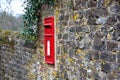 British Red Postbox in a wall Royalty Free Stock Photo